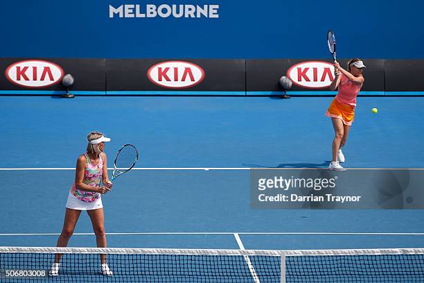 Nicole Bradkte of Australia and Barbara Schett of Austria comepete in their match against Kim Clijsters of Belgium and Iva Majoli of Croatia during...
