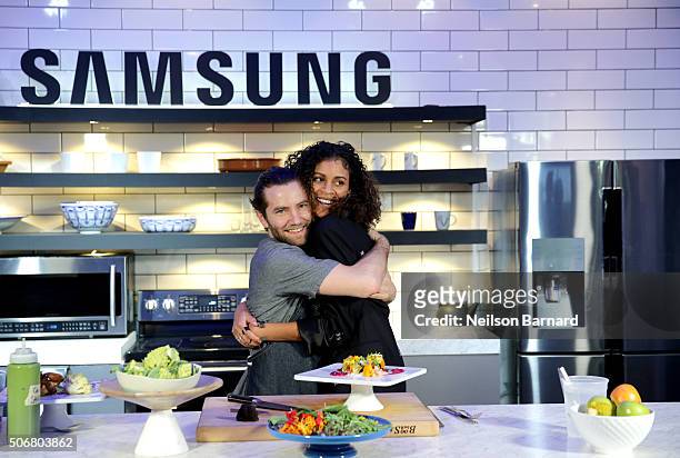 Chef Marcel Vigneron plates and offers Aluna Francis of AlunaGeorge the perfect bite showcasing Samsung Black Stainless Steel home appliances in the...