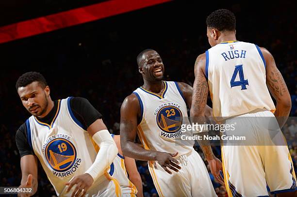 Draymond Green and Brandon Rush of the Golden State Warriors celebrate against the San Antonio Spurs on January 25, 2016 at ORACLE Arena in Oakland,...