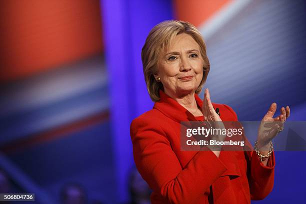 Hillary Clinton, former Secretary of State and 2016 Democratic presidential candidate, applauds during a Democratic Town Hall event in Des Moines,...