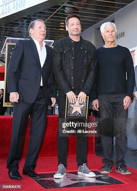 Actor Garry Shandling, actor David Duchovny and writer/director Chris Carter attend the star on the Hollywood Walk of Fame ceremony honoring David...