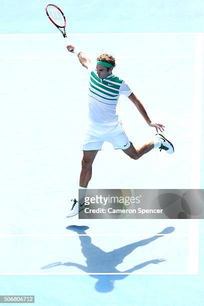 Roger Federer of Switzerland plays a backhand in his quarter final match against Tomas Berdych of the Czech Republic during day nine of the 2016...