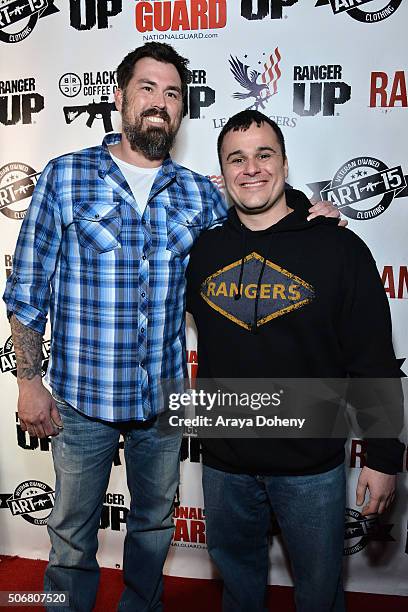 Former United States Navy SEAL Marcus Luttrell and founder and CEO of Ranger Up Nick Palmisciano attend the Range 15 x Maxim Magazine Party at Indie...