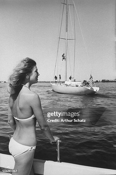 Susanna Wassaman sailing on a boat during trial runs for America's Cup races in the Newport harbour.