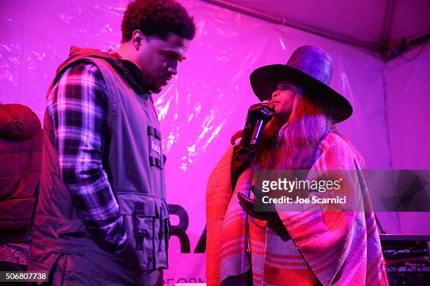 Steven Caple Jr and Erykah Badu attend "The Land" party at The Acura Studio at Sundance Film Festival 2016 on January 25, 2016 in Park City, Utah.