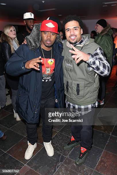 Nas and Steven Caple Jr attend "The Land" party at The Acura Studio at Sundance Film Festival 2016 on January 25, 2016 in Park City, Utah.
