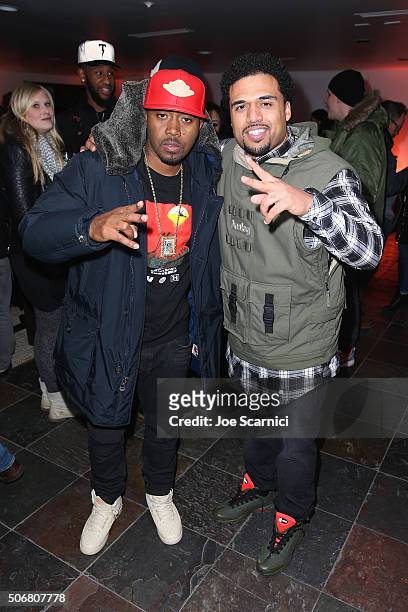 Nas and Steven Caple Jr attend "The Land" party at The Acura Studio at Sundance Film Festival 2016 on January 25, 2016 in Park City, Utah.