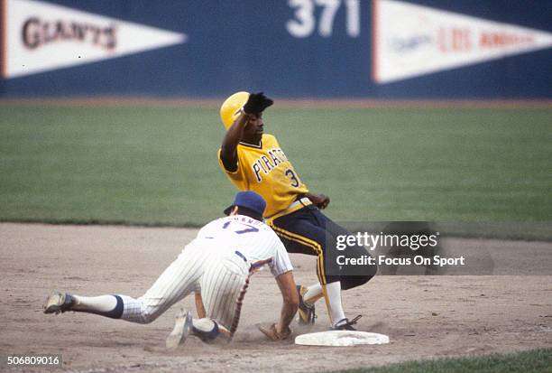 Marvell Wynne of the Pittsburgh Pirates gets back into first base beating the throw over to Keith Hernandez of the New York Mets during an Major...