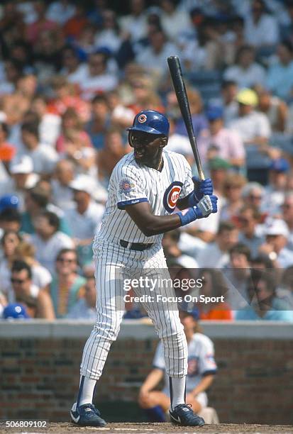 Marvell Wynne of the Chicago Cubs bats during an Major League Baseball game circa 1990 at Wrigley Field in Chicago, Illinois. Wynne played for the...