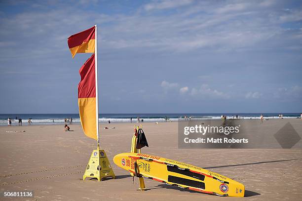 Surf life saving flags and rescue board are seen at Rainbow Bay on January 26, 2016 in Gold Coast, Australia. Australia Day, formerly known as...