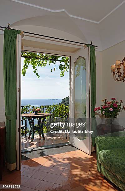 room with a view at hotel punta regina, positano - vertical stock pictures, royalty-free photos & images