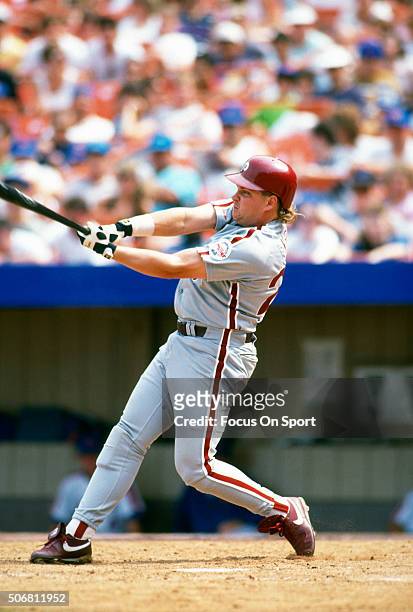 John Kruk of the Philadelphia Phillies bats against the New York Mets during a Major League Baseball game circa 1992 at Shea Stadium in the Queens...
