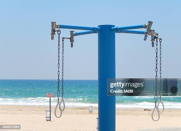 shower at the beach - ashdod stock pictures, royalty-free photos & images