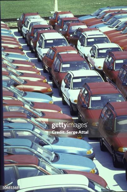 Cars parked outside Opel factory, a GM subsidiary.