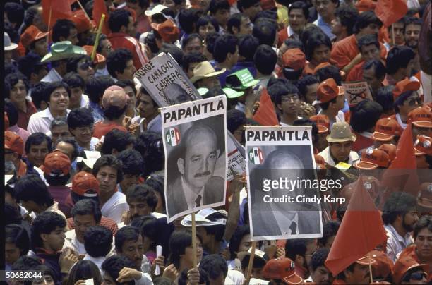 Crowd listening to PRI Presidential candidate Carlos Salinas de Gortari speaking at a PRI campaign rally.
