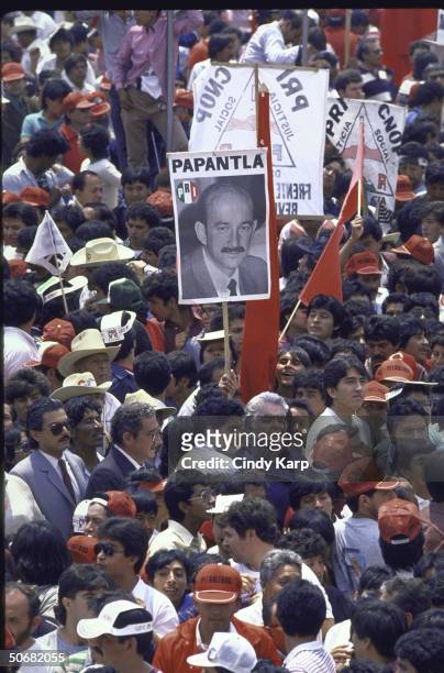 Crowd listens as PRI Presidential candidate Carlos Salinas de Gortari speaks at a PRI campaign rally.