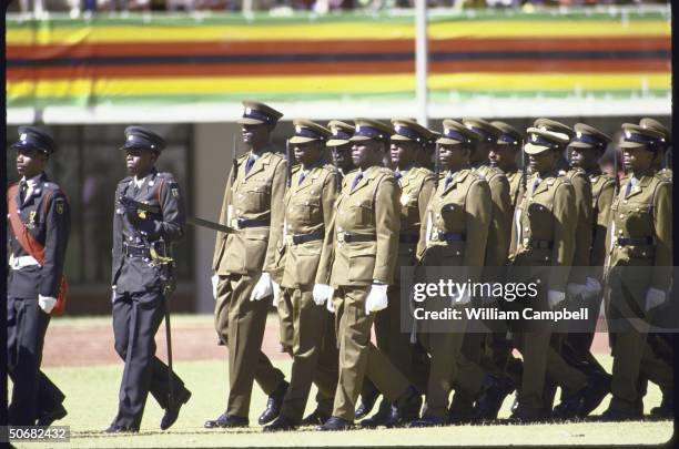 Ceremonial troops parading during Independence Day celebration at the National Stadium.