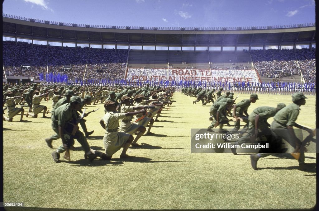 Youths performing a military drill durin