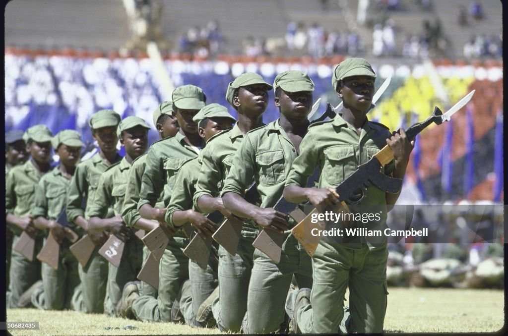 Youths performing a military drill durin