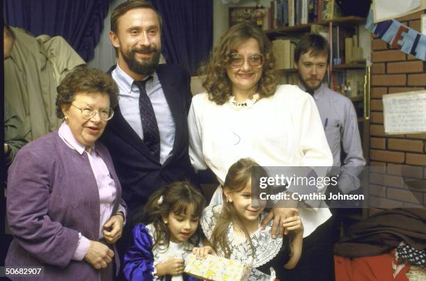 Refusenik Yuri Balovlenkov celebrating his reunion with his wife Elena, daughters Masha and Katya and Senator Barbara A. Mikulski, after waiting...
