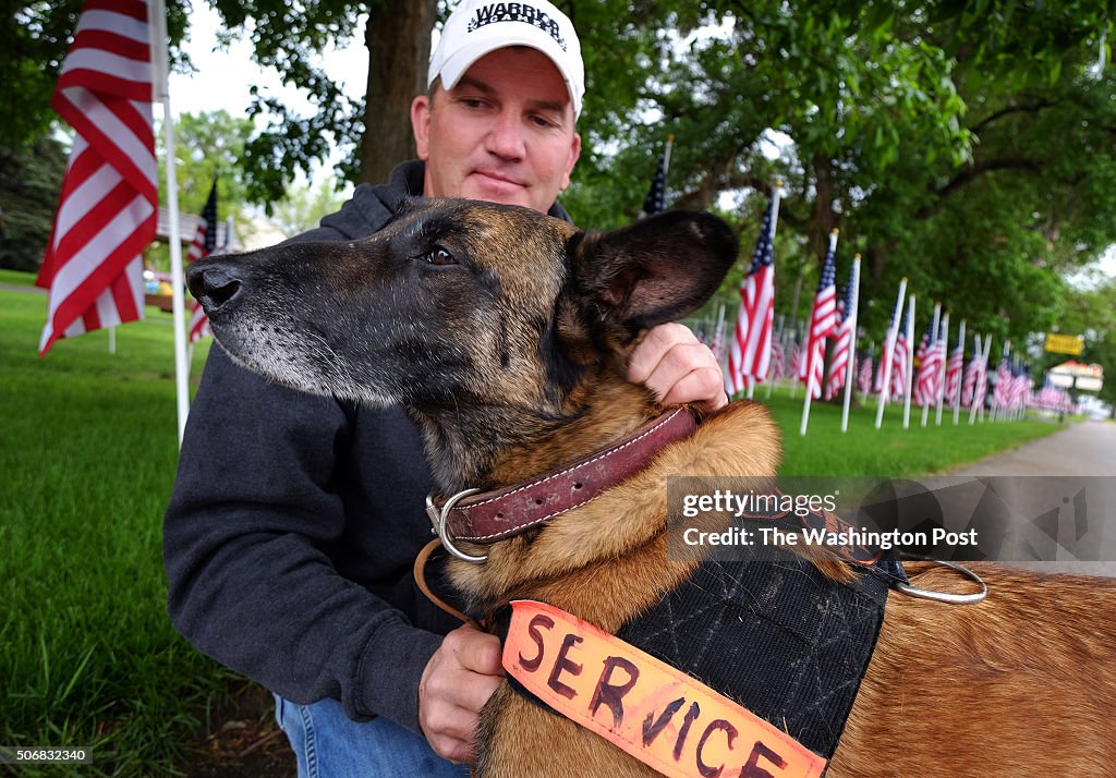 Col Bessler Sergeant 1st Class Matthew Bessler near a