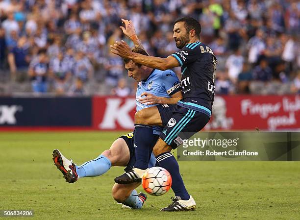 Seb Ryall of Sydney FC is challenged by Fahid Ben Khalfallah of Melbourne Victory during the round 16 A-League match between Melbourne Victory and...