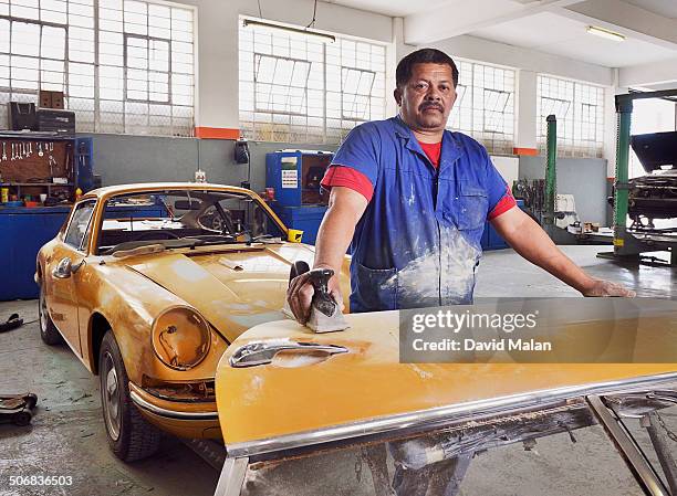 environmental portrait of a panel-beater, woodstock, cape town, south africa, - panel beater car stock pictures, royalty-free photos & images
