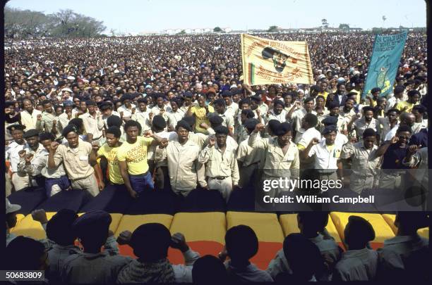 Flag-draped coffins of 18 blacks killed by police action during township unrest at massive funeral in Duncan Village near East London.