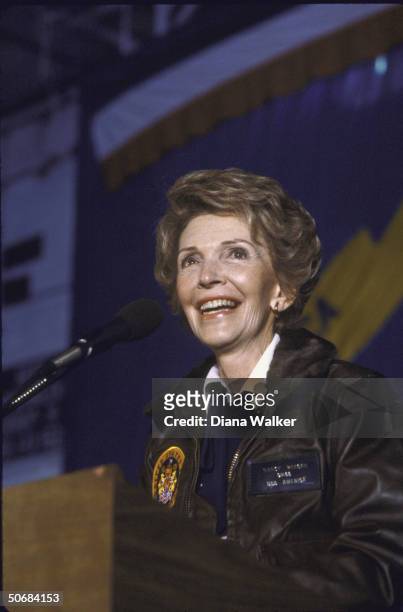 Nancy Reagan wearing Navy jacket given her while on board USS America.