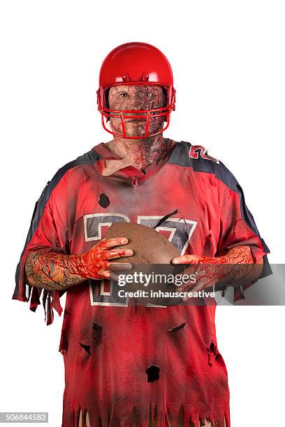 zombie football player - halloween ball stockfoto's en -beelden