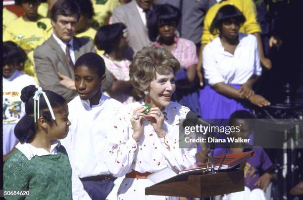 Wife of US Pres. Mrs. Ronald W. Reagan with DC public school children and others participating in just say no anti-drug program.