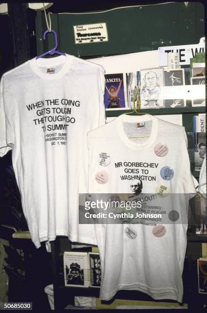 Ronald W. Reagan-Mikhail S. Gorbachev summit cards, buttons and t-shirt souvenirs, featuring cariacatures of the US and Soviet leaders and snippy,...