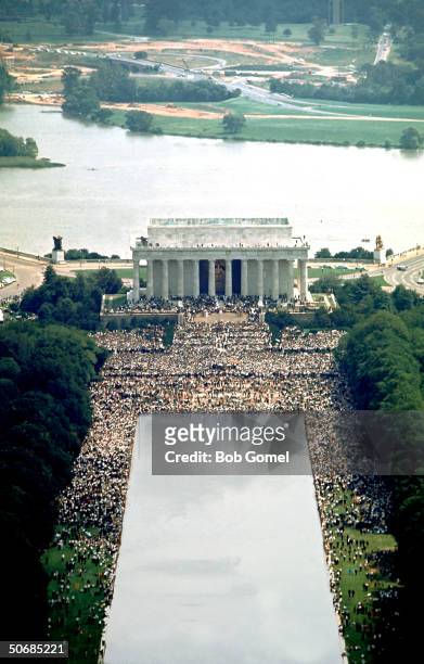 Overview of crowd on the mall in front of Lincoln Memorial during Martin Luther King Jr.'s famous 'I Have A Dream' speech, 28th August 1963.