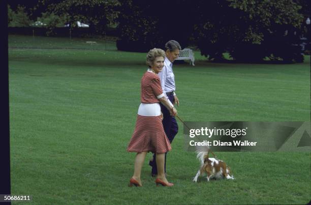 President Ronald W. Reagan, his wife Nancy, and their dog boarding Marine One copter ONTHEIR WAY TO cAMP dAVID.