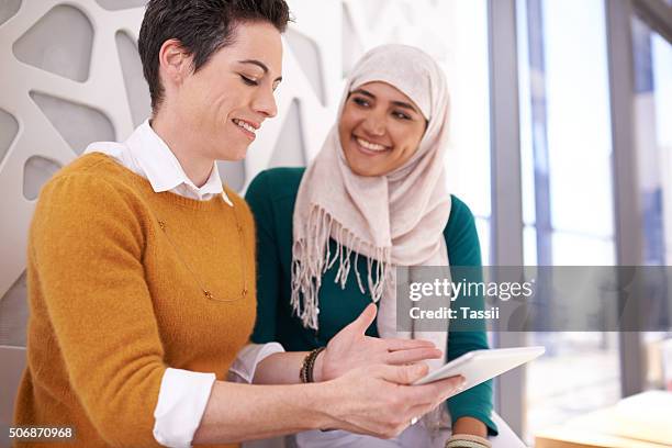 brainstorming their way to better business - arab woman stock pictures, royalty-free photos & images