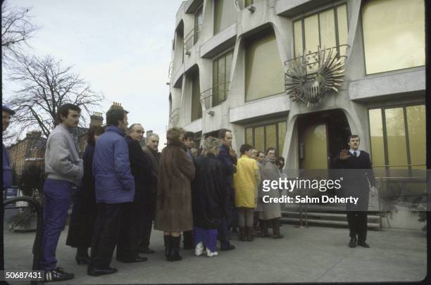 People waiting in line at the US Embassy to apply for Visas to emigrate.