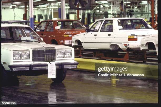 Assembly plant where the Chrysler Fifth Avenues are lined up parallel with the AMC Renault Alliance on the assembly lines since Chrysler bought AMC.