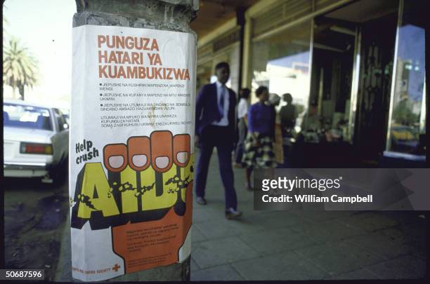 View of Red Cross posters warning against AIDS.
