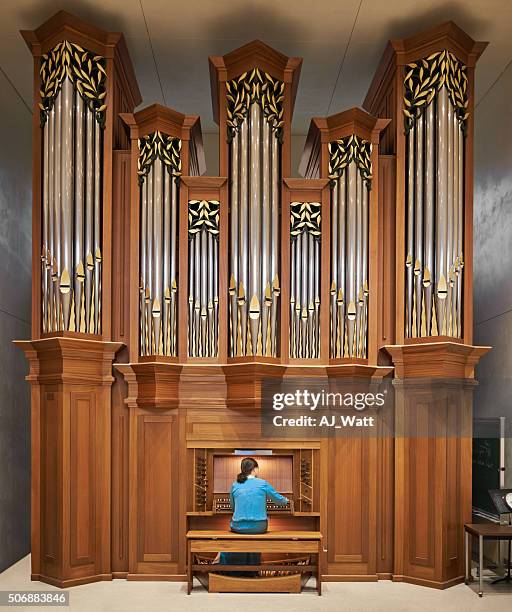 honing her skill - church organ stock pictures, royalty-free photos & images