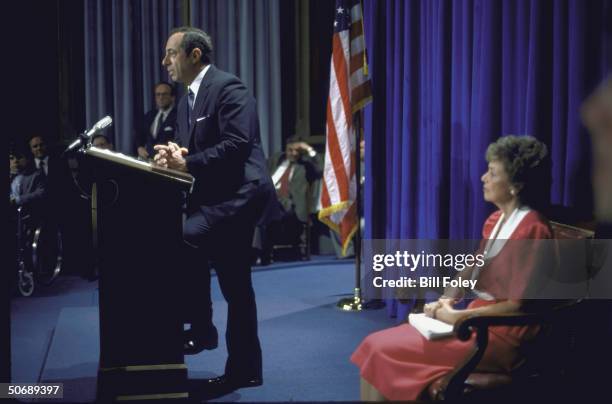 Governor of New York, Mario M. Cuomo annouces he will seek re-election, with wife, Matilda, seated at right.