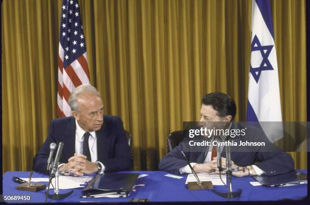 Israeli Defense Minister Itzhak Rabin and Defense Secretary Casper W. Weinberger signing SDI agreement, making Israel the third nation to join Star...