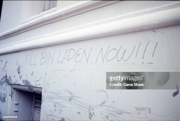 Graffiti stating Kill Bin Ladin Now! scrawled on building in lower Manhattan following terrorist attack on the World Trade Center.