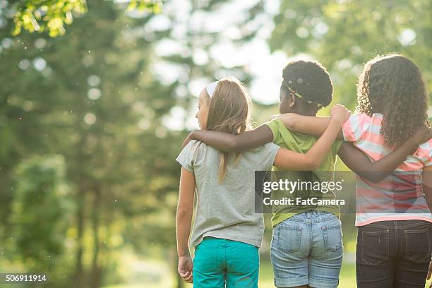 enjoying a sunny day at the park - endast flickor bildbanksfoton och bilder