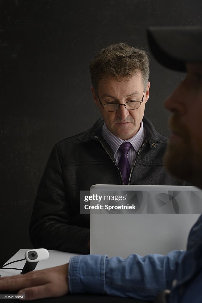 Polygraph Operator Interrogating An Employee High-Res Stock Photo ...