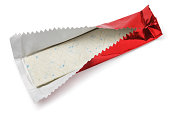 Chewing gum plate in red foil on white