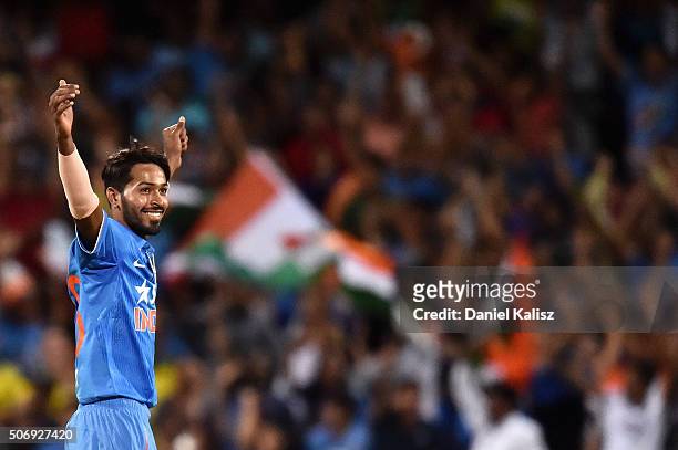 Hardik Pandya of India reacts after taking the wicket of Matthew Wade of Australia during game one of the Twenty20 International match between...