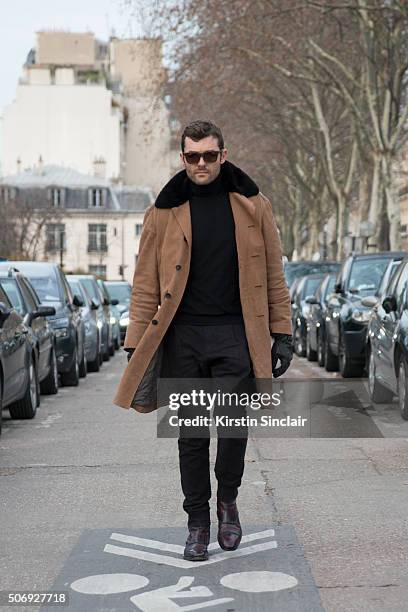 Photographer Francois Xavier Watine wears all Berluti and Skog sunglasses on day 2 of Paris Haute Couture Fashion Week Spring/Summer 2016, on January...