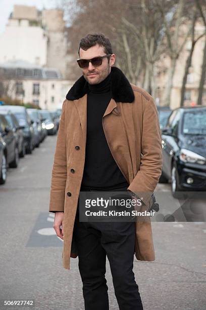 Photographer Francois Xavier Watine wears all Berluti and Skog sunglasses on day 2 of Paris Haute Couture Fashion Week Spring/Summer 2016, on January...