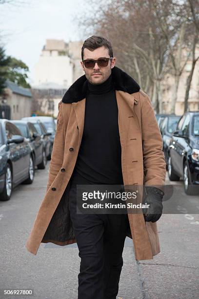 Photographer Francois Xavier Watine wears all Berluti and Skog sunglasses on day 2 of Paris Haute Couture Fashion Week Spring/Summer 2016, on January...