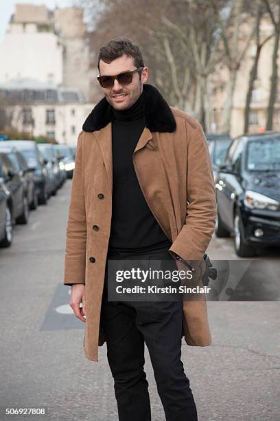 Photographer Francois Xavier Watine wears all Berluti and Skog sunglasses on day 2 of Paris Haute Couture Fashion Week Spring/Summer 2016, on January...